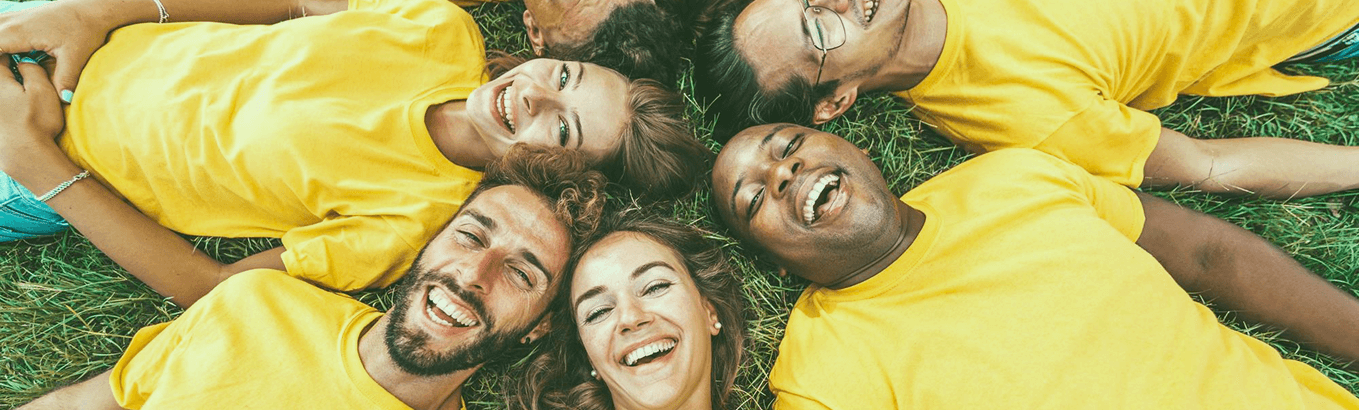 Group of people in yellow shirts